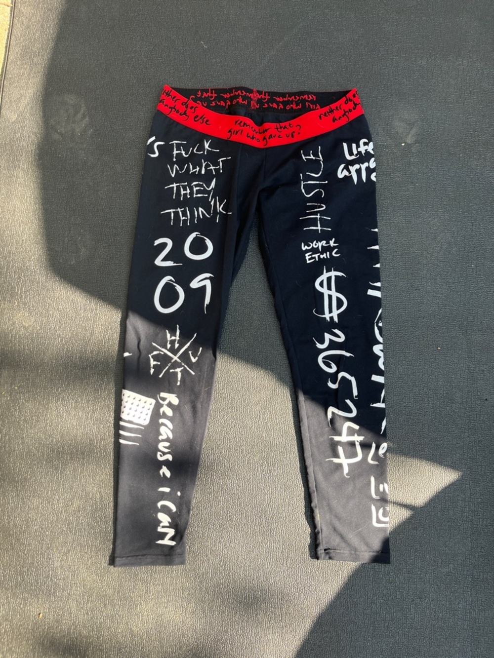 Source Unknown Black Leggings with White Graffiti and Red Waistband